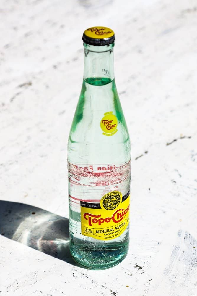 A bottle of Topo Chico soda